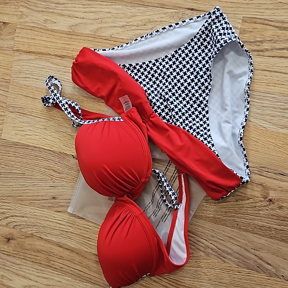Red & blue bikini.  Padded top & adjustable straps. Size Large.